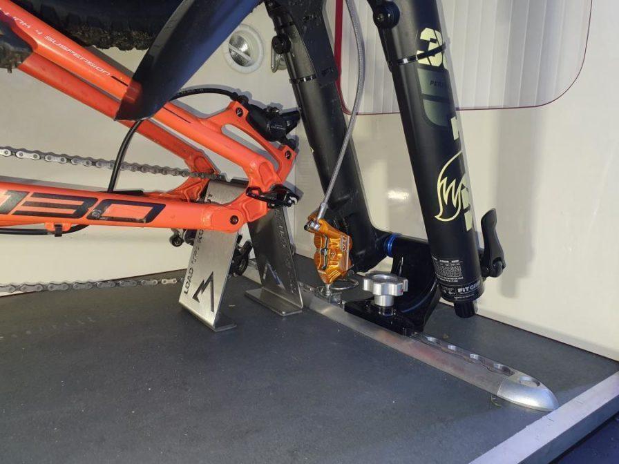 MTB Rear Axle Stand - Loaded Bikes Loaded Bikes Fork Mounts and Universal Rear Axle Supports in small garage space of converted Mercedes LWB Sprinter